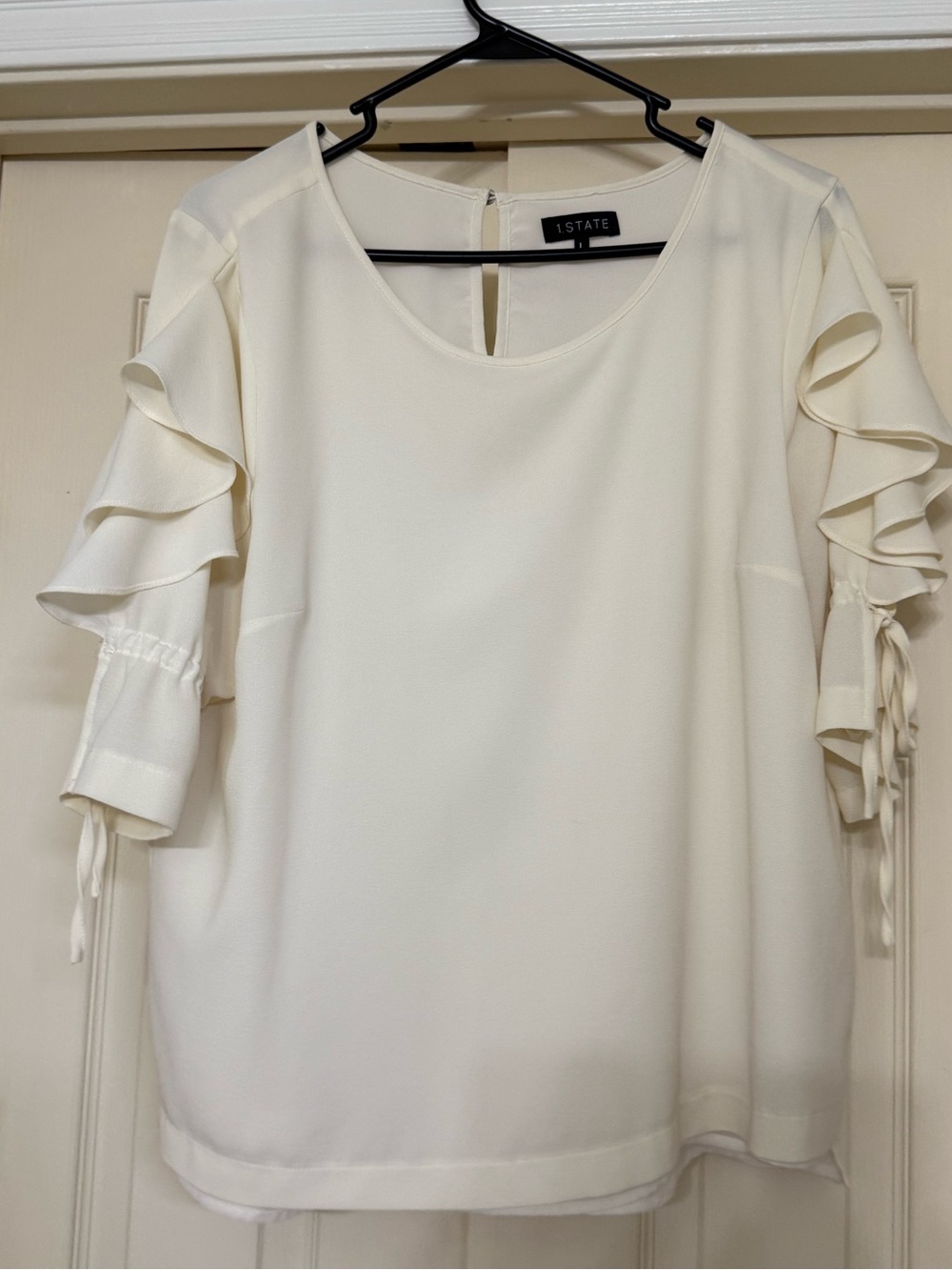 1. State Ivory Ruffle Sleeve Blouse